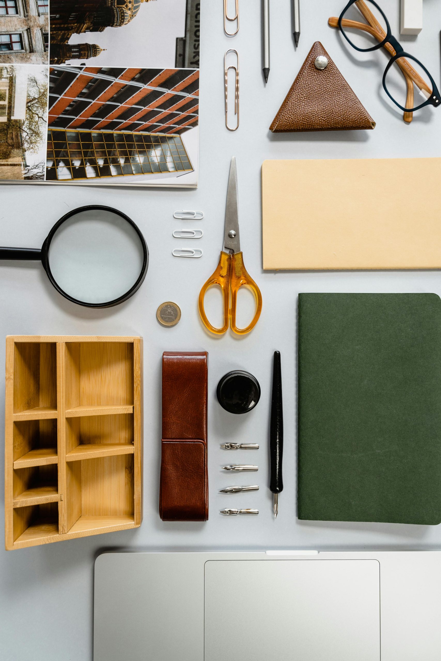 An assortment of neatly arranged stationery items on a white background, perfect for office or study themes.